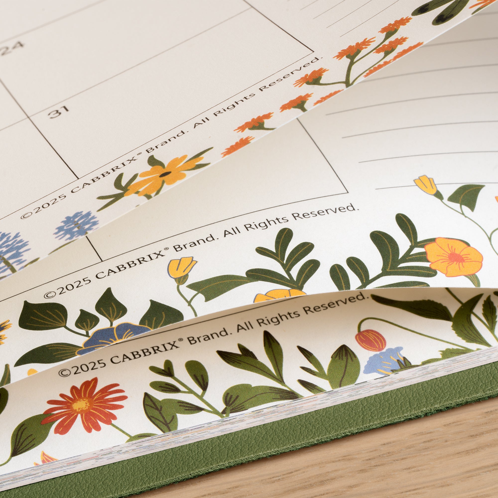 Floral design on a calendar with 'CABBRIX' branding.