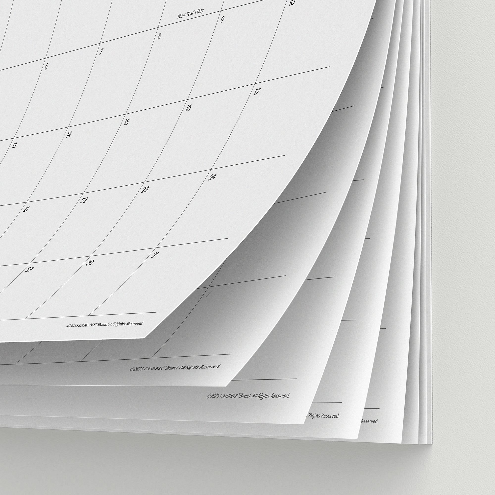 Stack of white calendar pages with grid lines on a light gray background