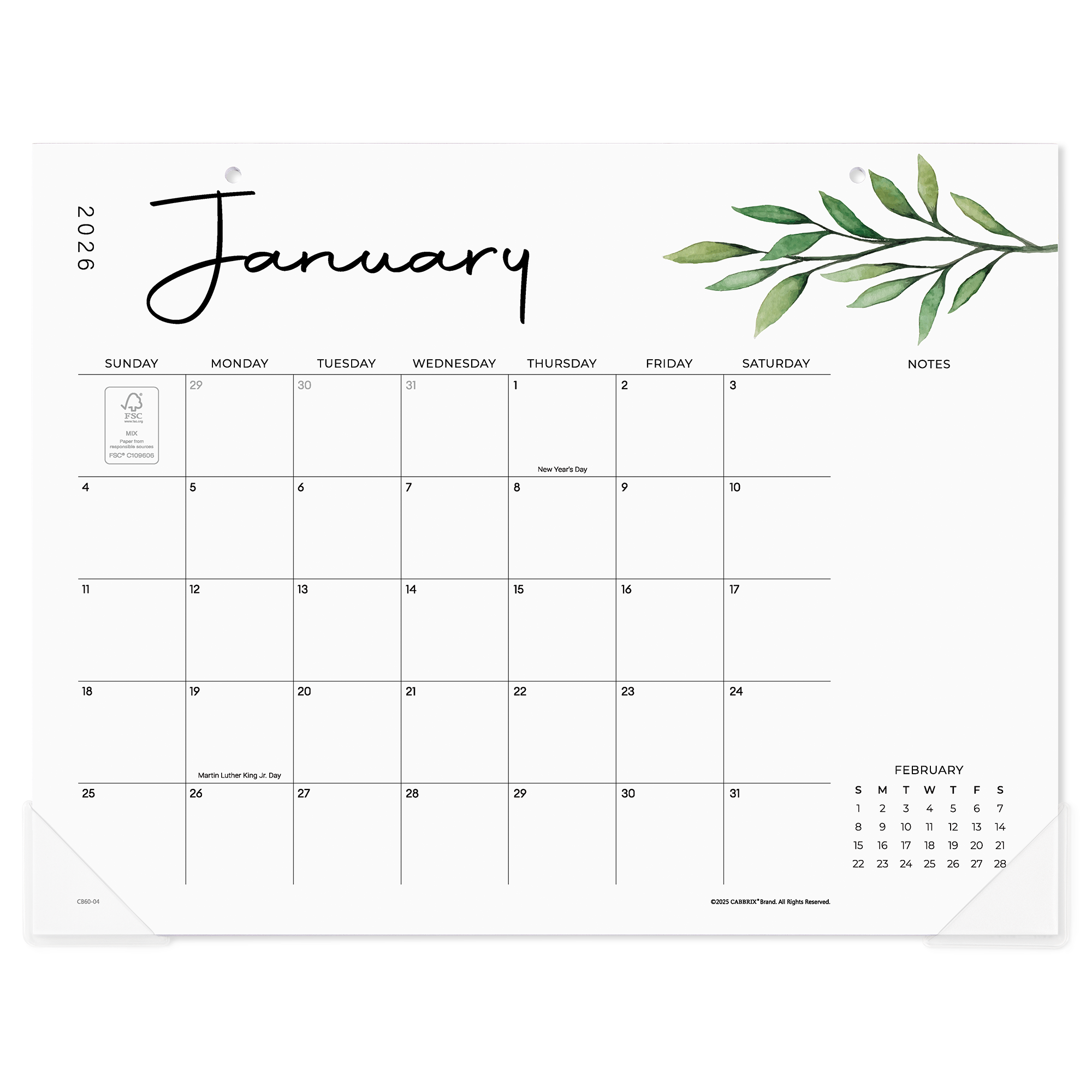 January 2023 calendar with green leaves on a white background