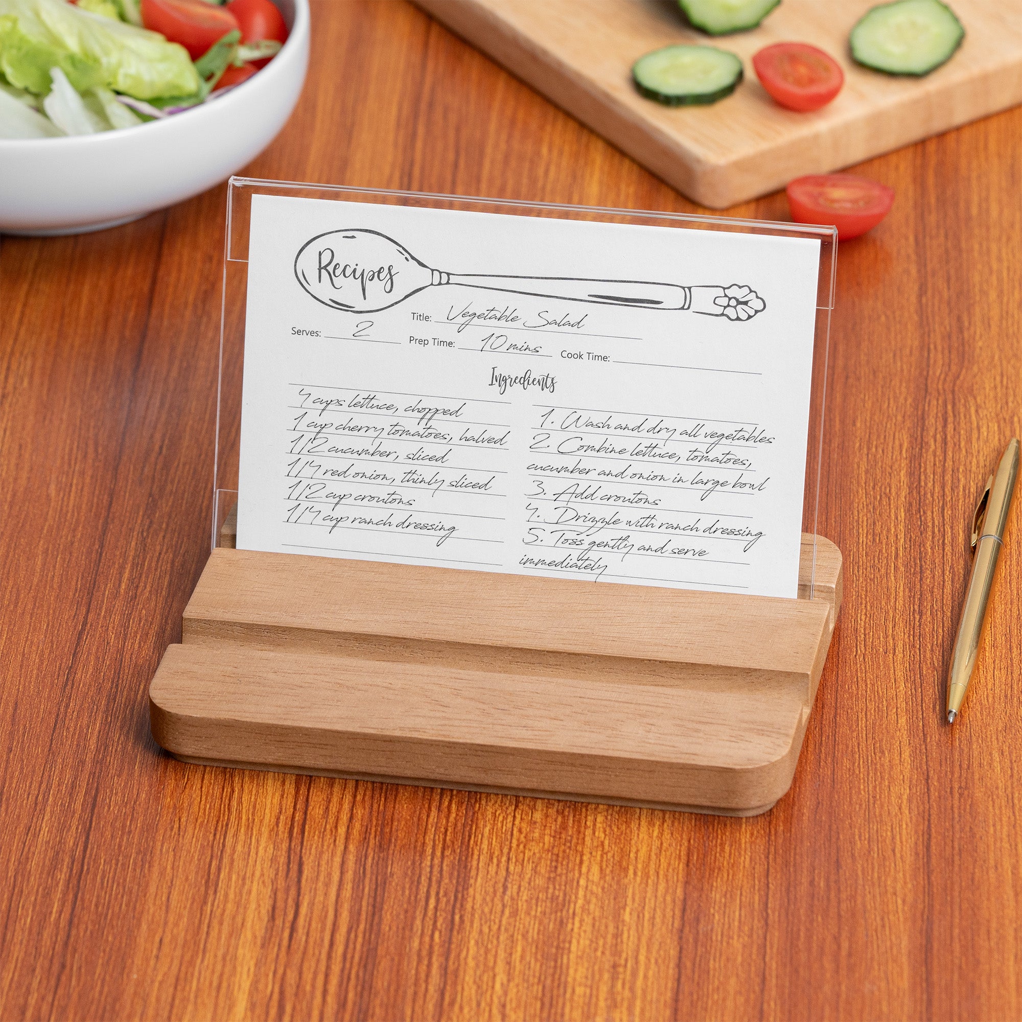 Wooden stand with recipe card on a wooden table with vegetables in the background